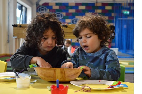 craft sharing siblings.jpg